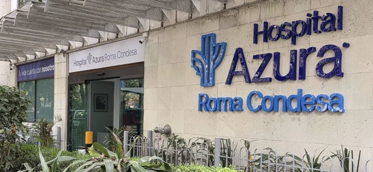 Exterior entrance of Hospital Azura Roma Condesa with blue saguaro cactus logo and signage on white wall